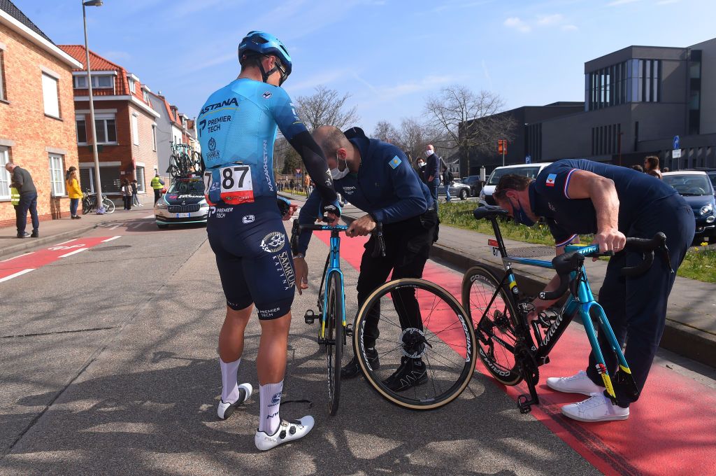 DE PANNE BELGIUM MARCH 24 Artyom Zakharov of Kazahkstan and Team Astana Premier Tech during the 45th Oxyclean Brugge De Panne 2021 Men Classic a 2039km race from Brugge to De Panne Mechanic Mechanical Problem OxycleanClassic on March 24 2021 in De Panne Belgium Photo by Luc ClaessenGetty Images