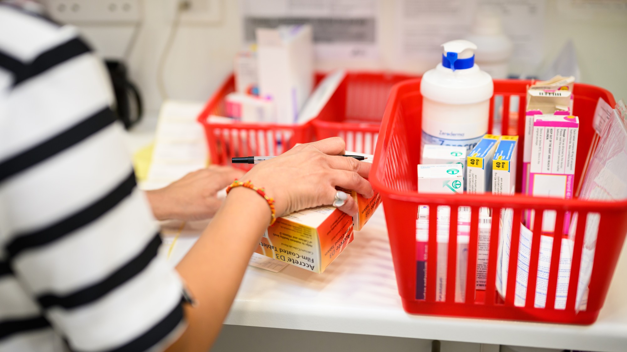  A pharmacist prepares a prescription