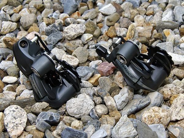 The standard Dura-Ace rear derailleur houses the conventional coil spring within the parallelogram but the Di2 unit just needs the stepper motor.