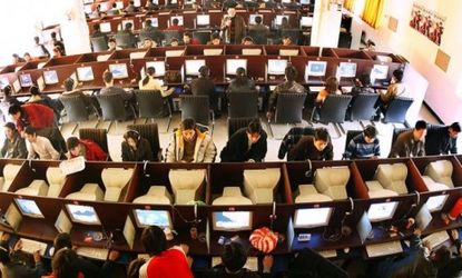 A busy internet cafe in China: 246 million internet users were added in China and India between 2007 and 2010, according to a new study quantifying the internet's worth.