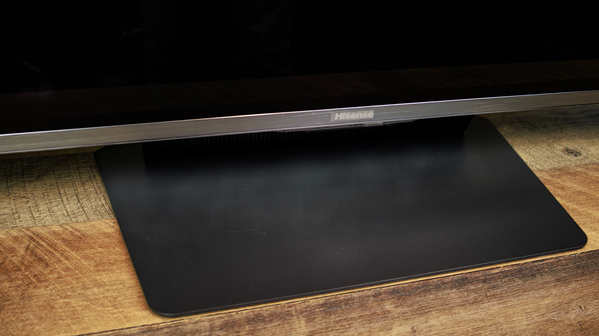 The pedestal of a Hisense UR9 RGB Mini-LED TV