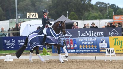 Charlotte Dujardin rides Braveheart II in trot, wearing the LeMieux Grand Prix 2026 Champion rug, after winning the LeMieux grand prix gold championship.