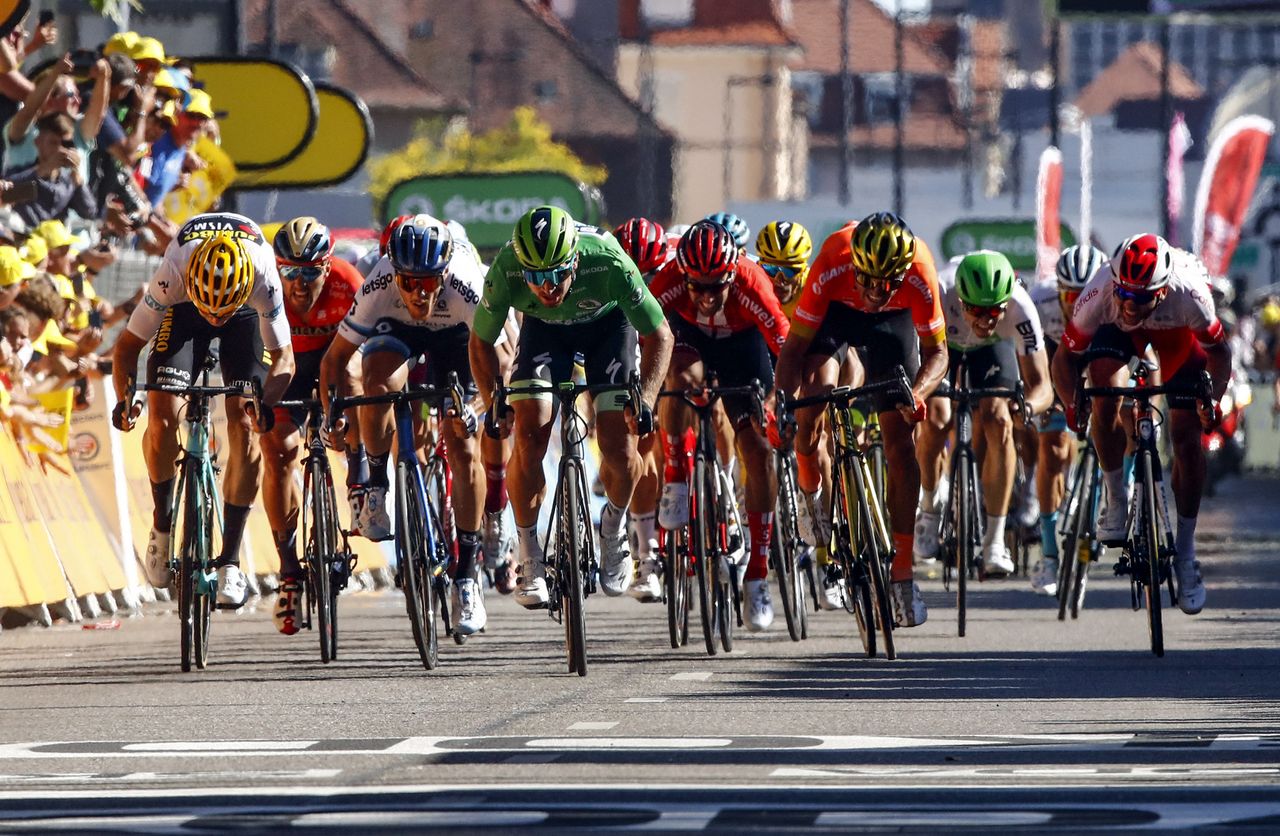 Wout Van Aert, Matteo Trentin and Peter Sagan sprint for the line