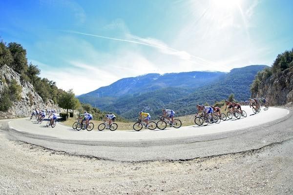 Sylvain Chavanel descends with his teammates around him.