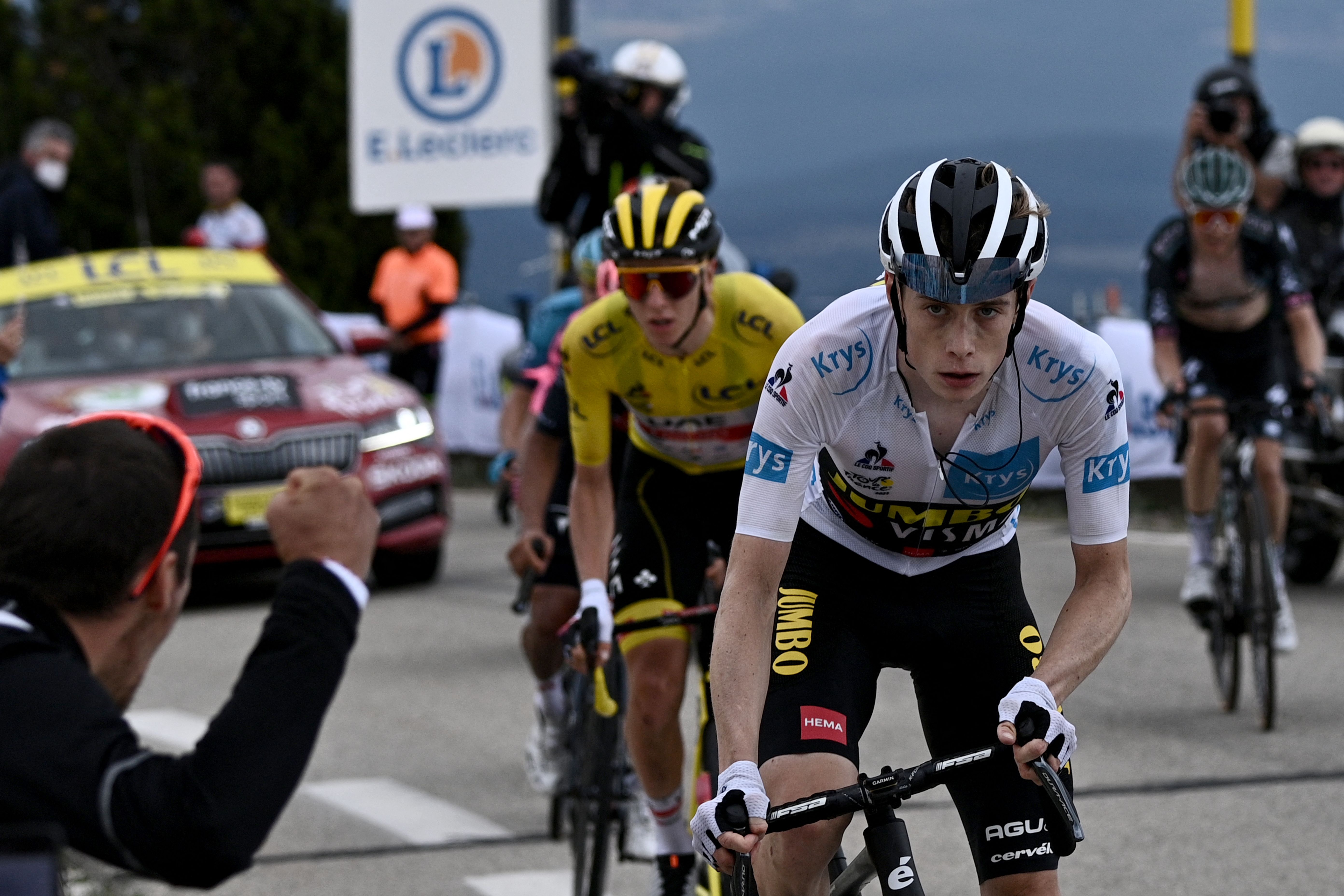 Team Jumbo Visma's Jonas Vingegaard of Denmark (R) wearing the best young's white jersey rides ahead of Team UAE Emirates' Tadej Pogacar of Slovenia wearing the overall leader's yellow jersey as they climb the Mont Ventoux during the 11th stage of the 108th edition of the Tour de France cycling race, 198 km between Sorgues and Malaucene, on July 07, 2021. (Photo by Anne-Christine POUJOULAT / AFP) (Photo by ANNE-CHRISTINE POUJOULAT/AFP via Getty Images)