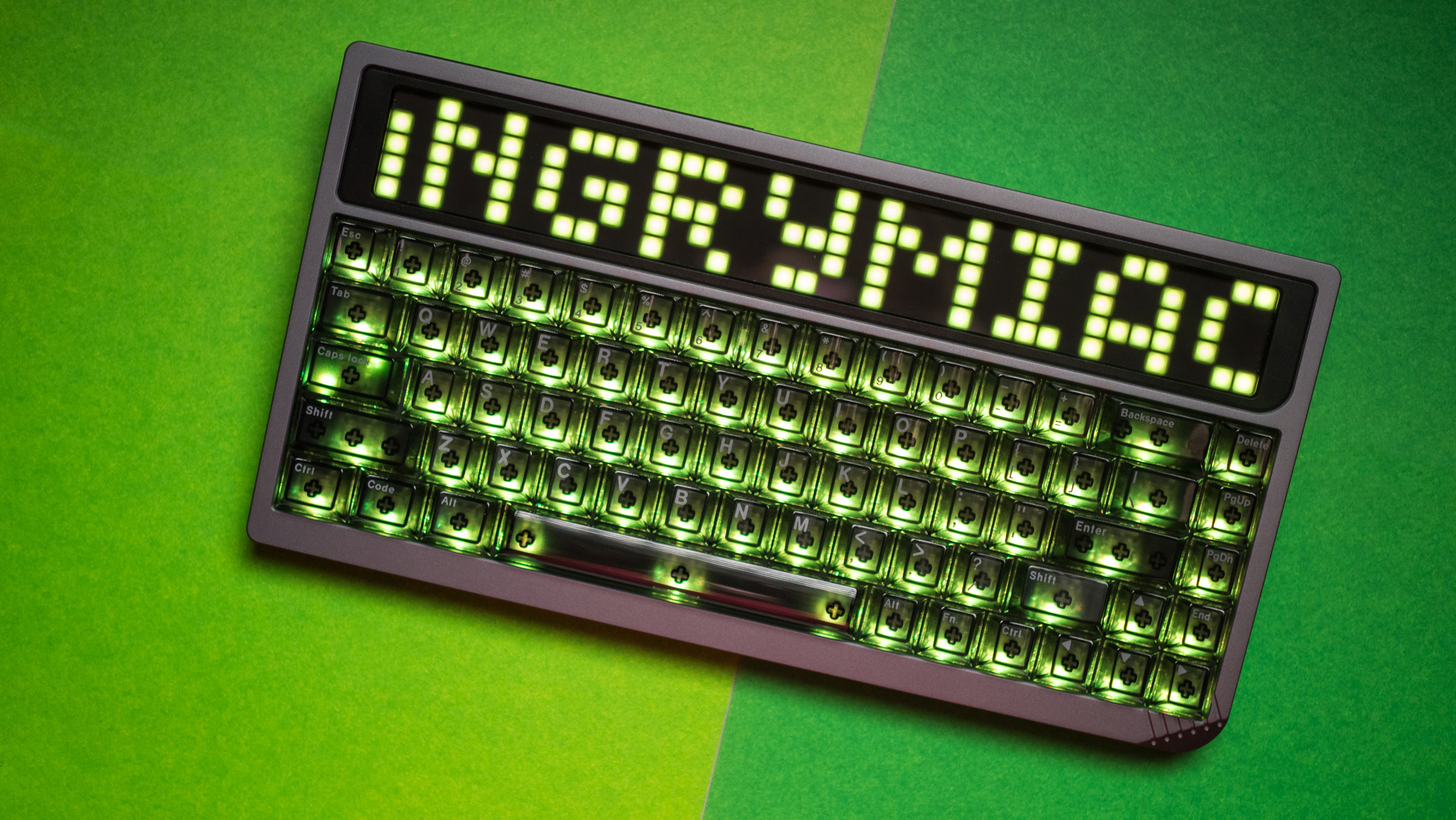 Angry Miao AM RGB 65 keyboard with text on the dot matrix panel