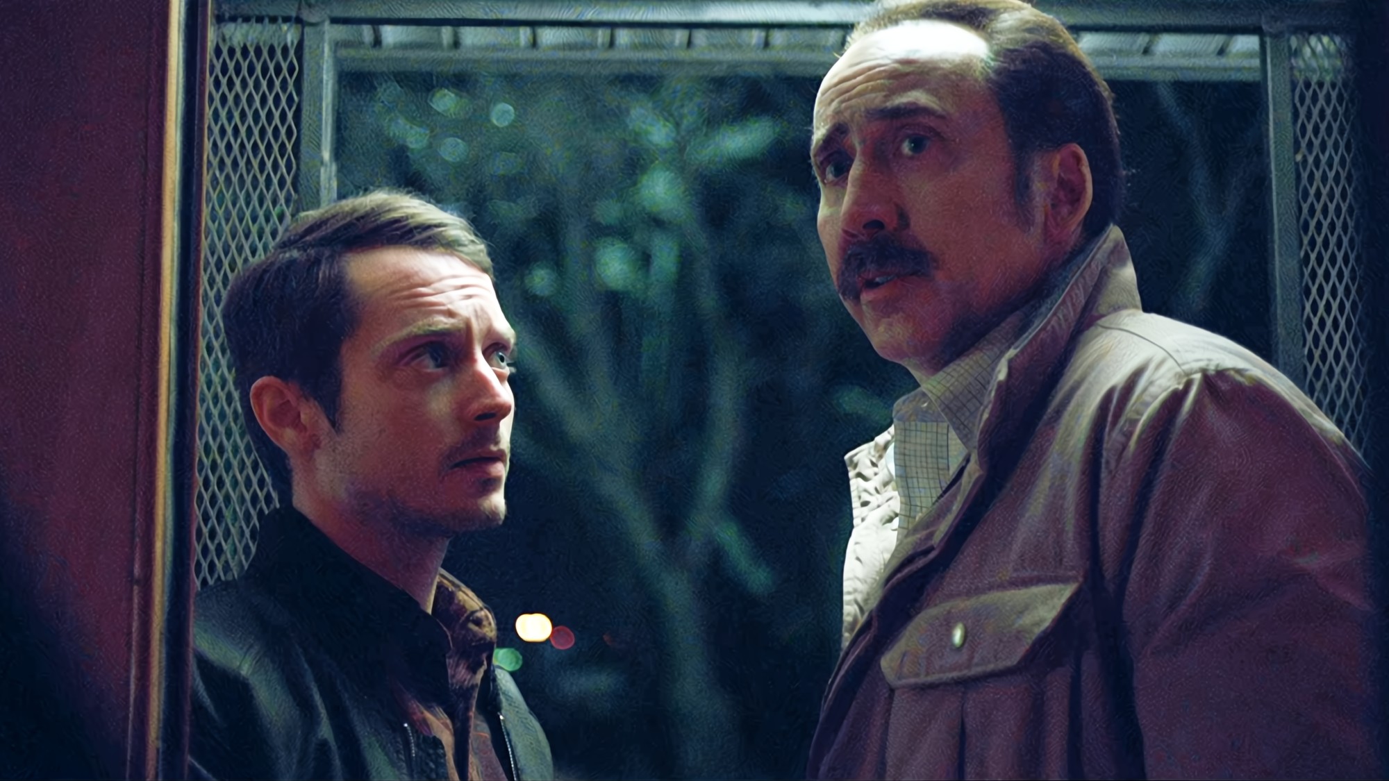 Elijah Wood and Nicolas Cage in The Trust