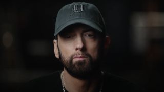 Eminem looks straight at the camera confidently in Stans.
