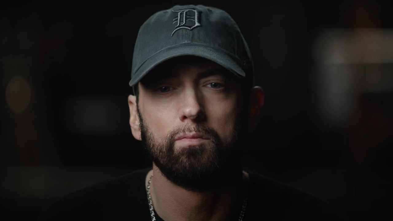 Eminem looks straight at the camera confidently in Stans. 