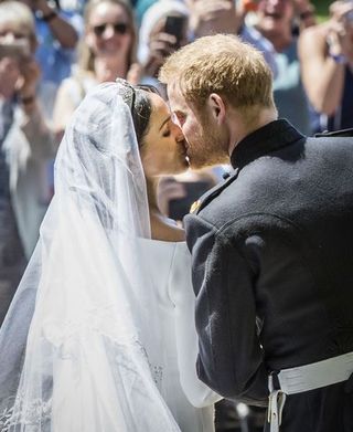 Prince Harry and Meghan Markle Kiss