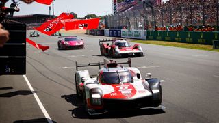 Cars passing the finish line at 24 hours of Le Mans