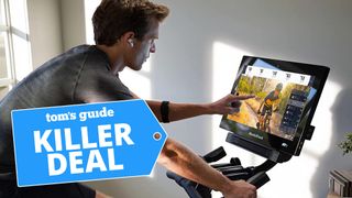 NordicTrack Commercial S22i Studio Cycle: a photo of a man using the NordicTrack S22i