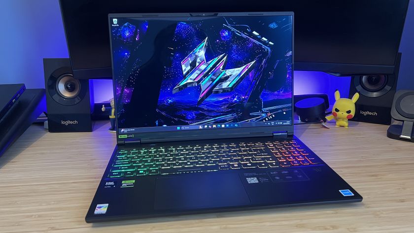 Acer Predator Helios Neo 16S AI gaming laptop on a wooden desk
