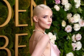 Anya Taylor-Joy, The actor paired a blush colored eye shadow and nude berry lip with her pink gown and 64-Carat Tiffany opal necklace.