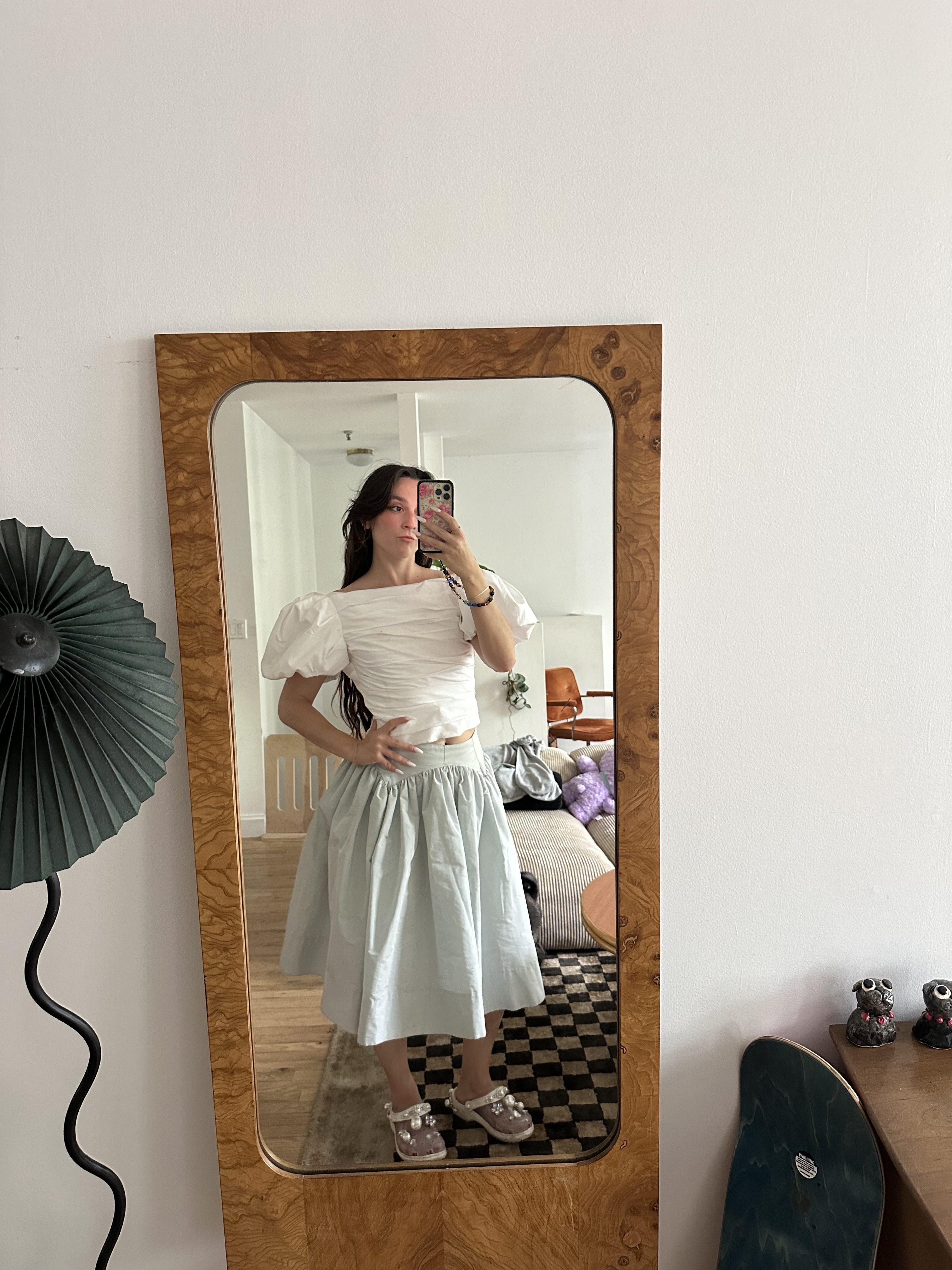 Girl in Simone Rocha clear Croc slip-on shoes