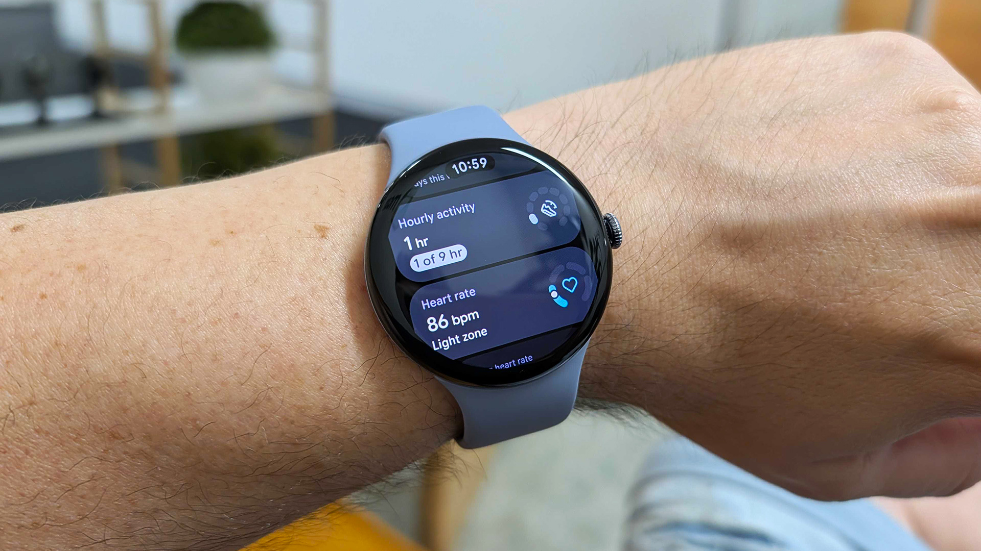 Google Pixel Watch 4 on wrist showing hourly activity