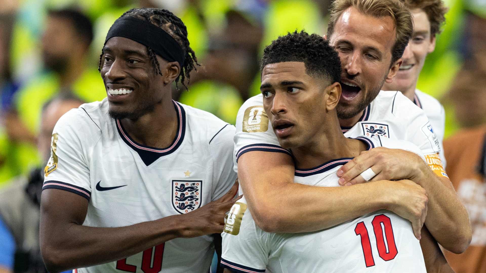 Harry Kane and Noni Madueke celebrate a goal with Jude Bellingham of England during the FIFA World Cup 2026