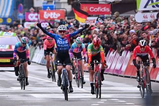 LIEGE BELGIUM APRIL 24 LR Grace Brown of Australia and Team FDJ Suez celebrates at finish line as race winner ahead of Elisa Longo Borghini of Italy and Team Lidl Trek and Demi Vollering of The Netherlands and Team SD Worx Protime during the 8th Liege Bastogne Liege Femmes 2024 a 1529km one day race from Bastogne to Liege UCIWWT on April 24 2024 in Liege Belgium Photo by Luc ClaessenGetty Images