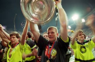 Martin Kree (centre) celebrates Borussia Dortmund's Champions League win alongside Andreas Moller and Karl-Heinz Riedle in 1997.