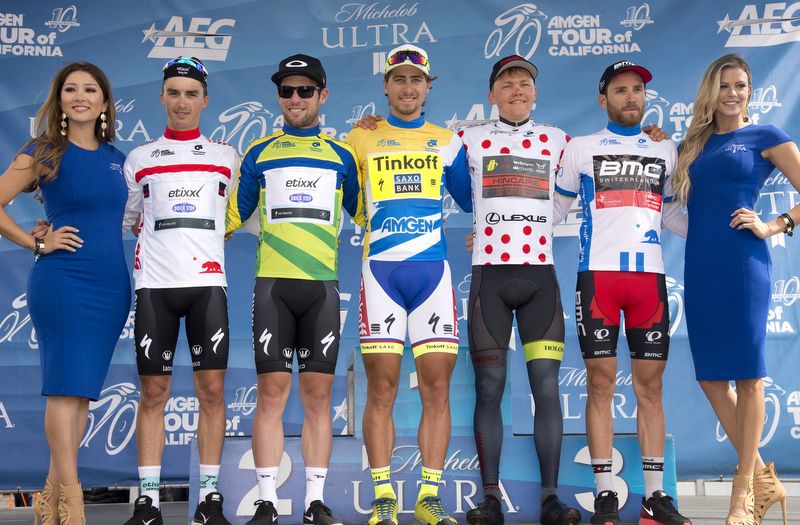 The jersey wearers on the podium after the time trial
