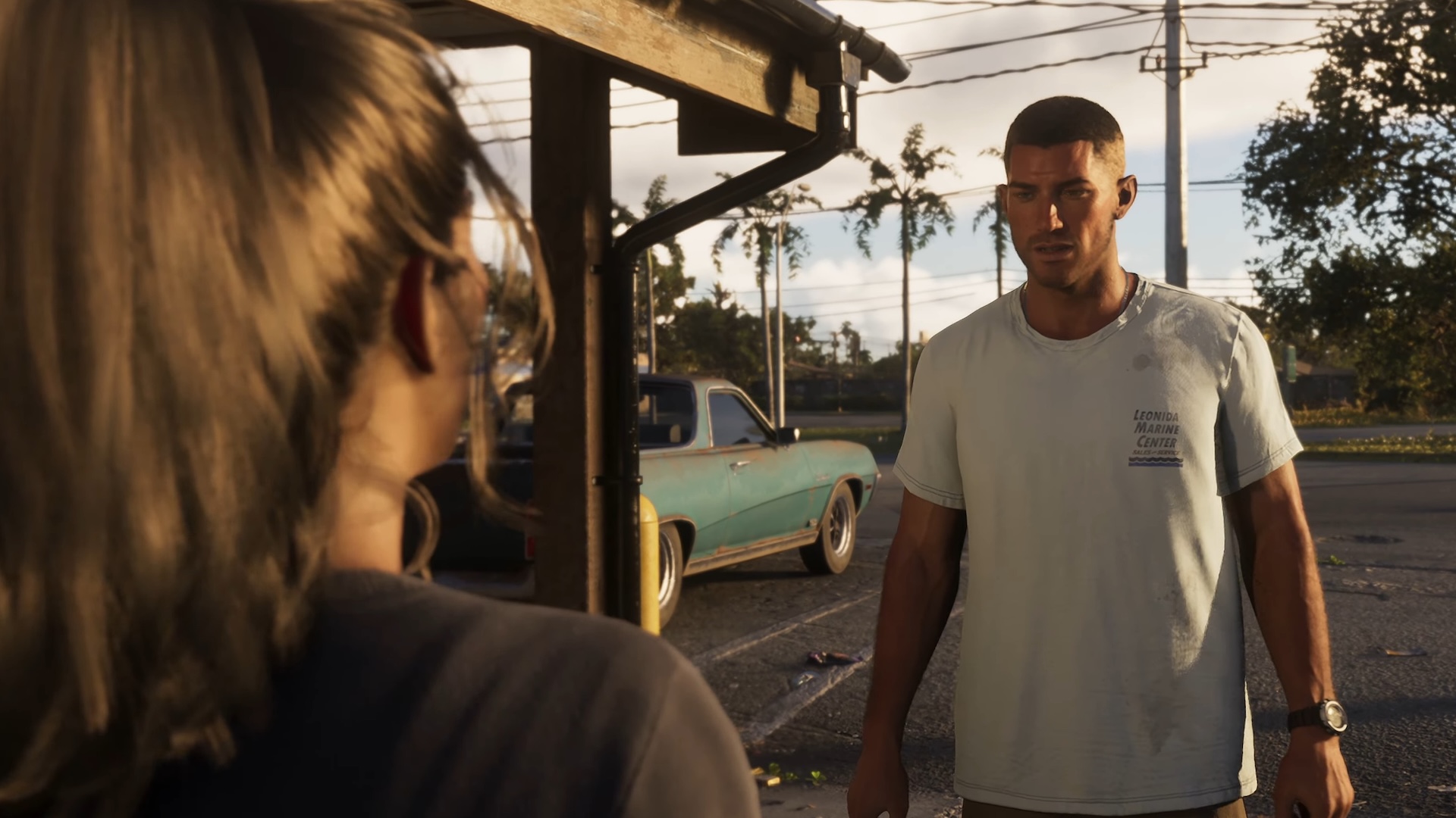 Lucia and Jason have a conversation in a parking lot
