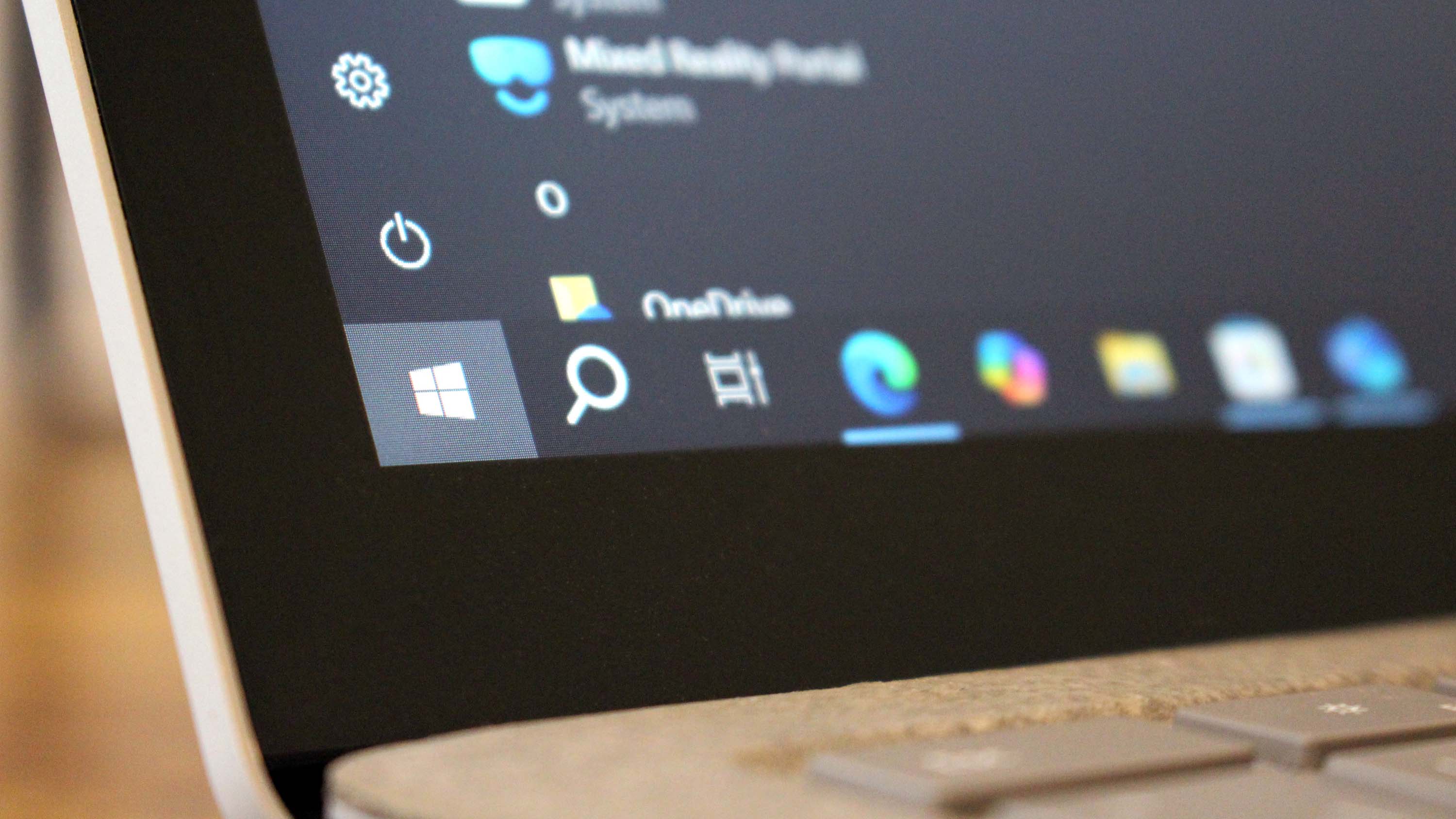 Windows 10 running on a laptop with desktop elements displayed on its screen