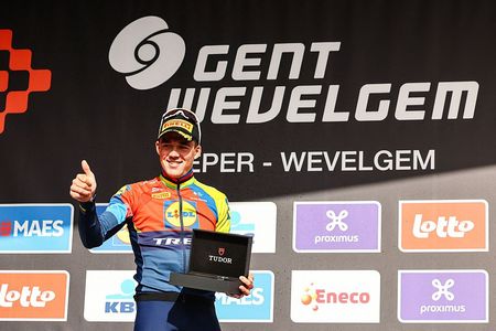 Danish Mads Pedersen of Lidl-Trek celebrates on the podium after winning the men elite 'Gent-Wevelgem - In Flanders Fields' one day cycling race, 250.3 km from Ieper to Wevelgem, Sunday 30 March 2025. BELGA PHOTO DAVID PINTENS (Photo by DAVID PINTENS / BELGA MAG / Belga via AFP)