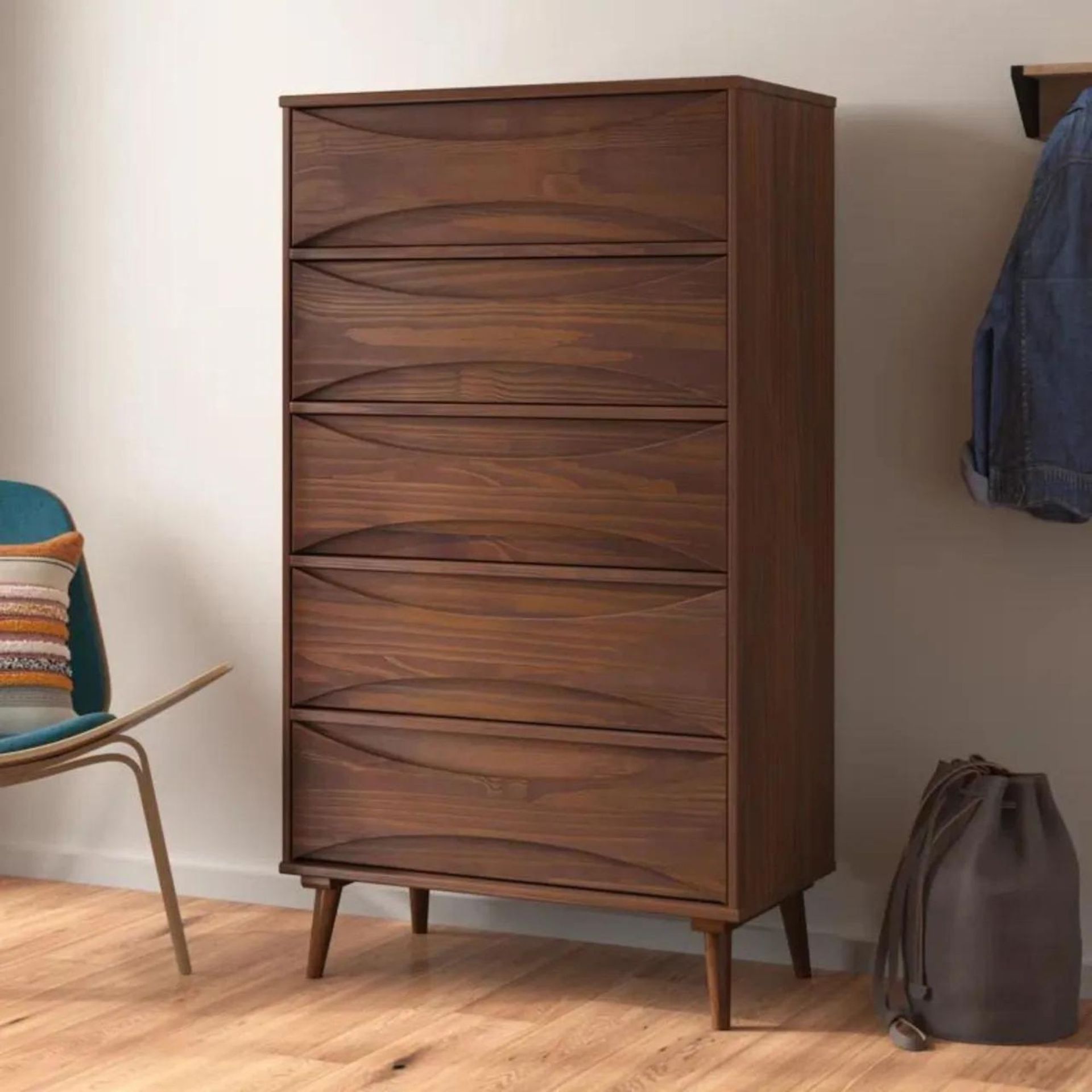 Wayfair Amoakuh Chest against a white wall.