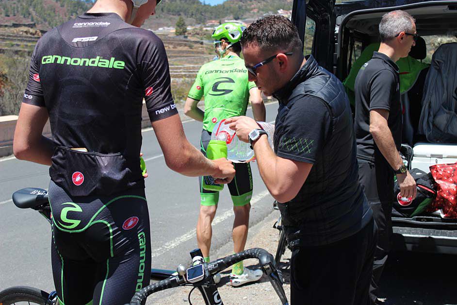 Rider getting drink refills before the climb up Mt Teide