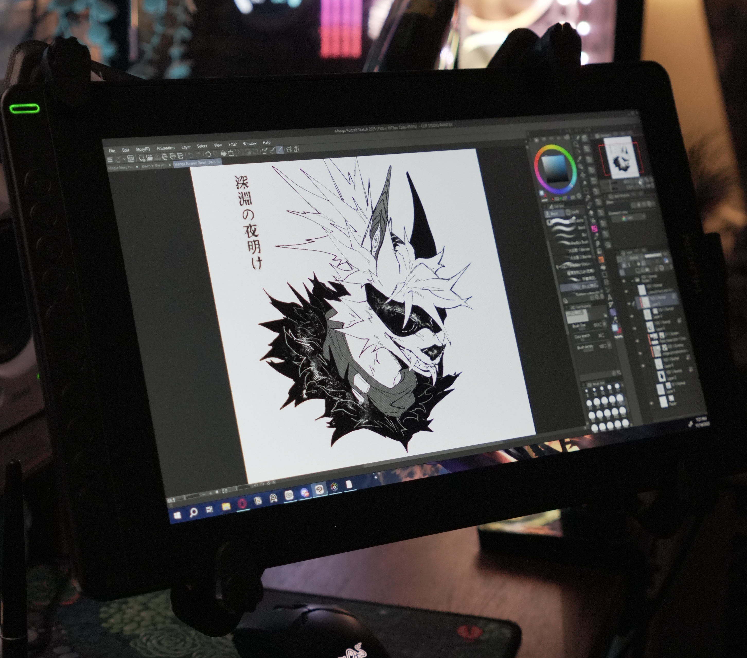 drawing tablets; an artist's desk with drawing tablet and monitor