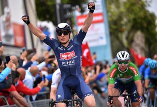 TURGUTREIS TURKEY APRIL 17 Jasper Philipsen of Belgium and Team AlpecinFenix celebrates as he crosses the finish line to win the the 56th Presidential Cycling Tour Of Turkey 2021 Stage 7 a 180km stage from Marmaris to Turgutreis TUR2021 tourofturkeyTUR on April 17 2021 in Turgutreis Turkey Photo by Stuart FranklinGetty Images