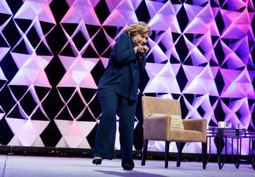 Watch Hillary Clinton dodge a flying shoe