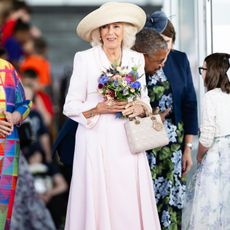 Queen Camilla wearing a Lady Dior bag