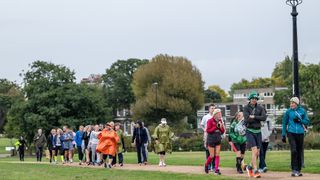 Runners walking to the start areas on Blackheath ahead of the start of the 2022 London Marathon