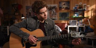 Joshua Bassett on the guitar as Ricky in High School Musical series