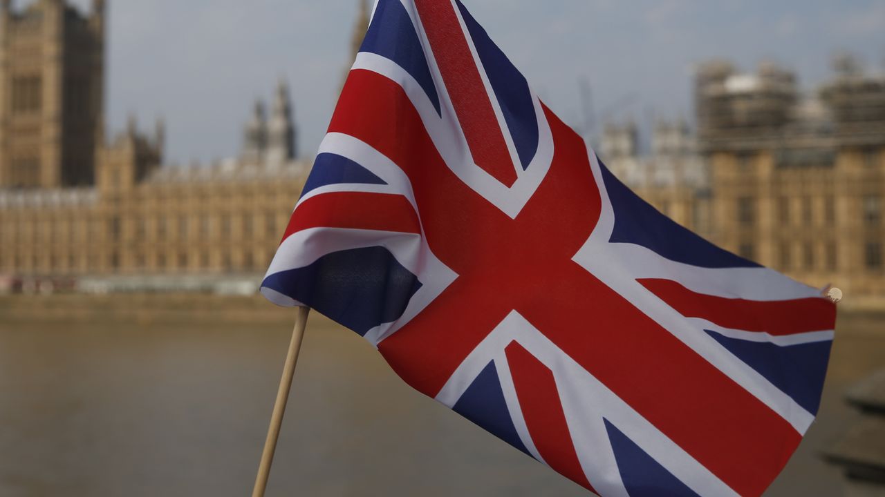 Union Jack flies before Parliament 