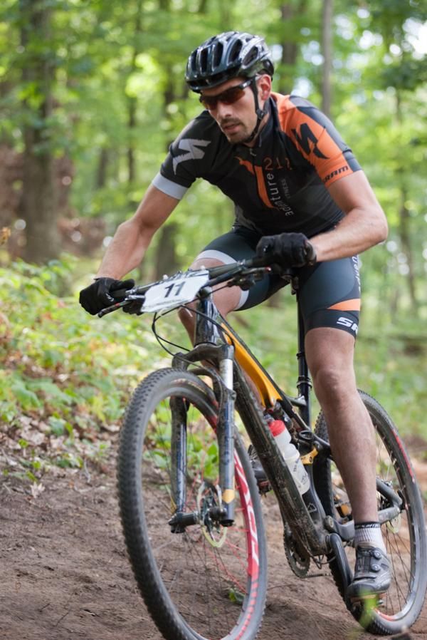 Darrin Braun (Adventure 212 Specialized) rides to a third place finish in front of hometown fans