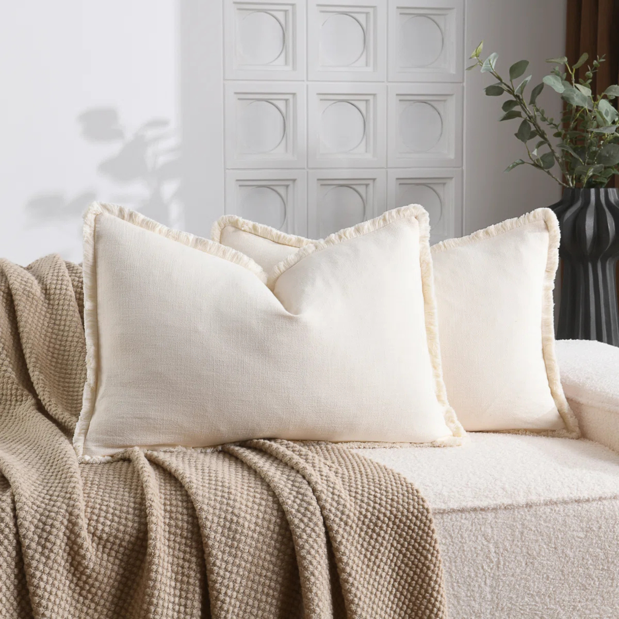 Two rectangular beige throw pillows from Wayfair