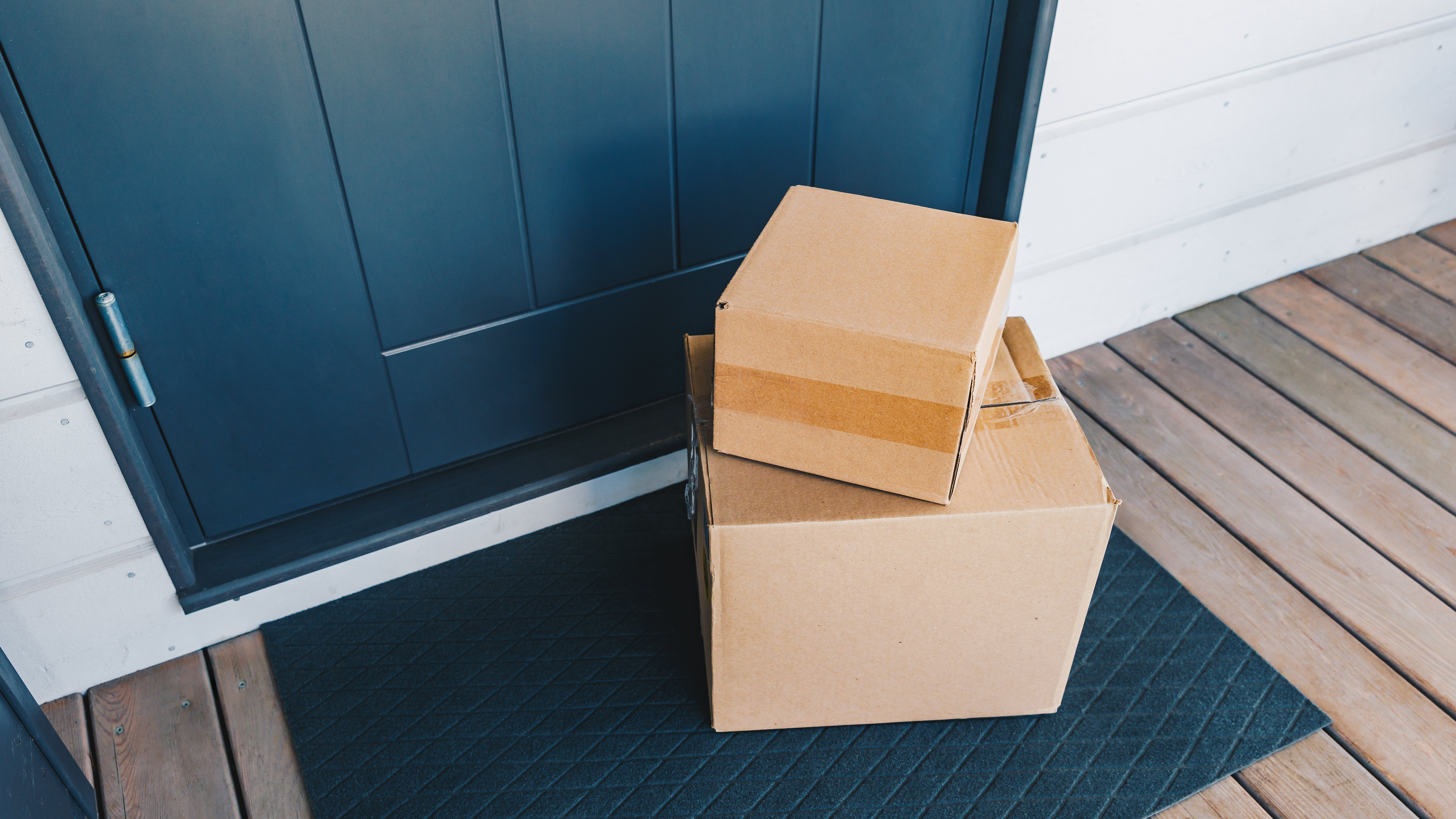 Cardboard packages outside front door