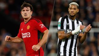 Harry Maguire of Manchester United and Joelinton of Newcastle United playing during a Carabao Cup match