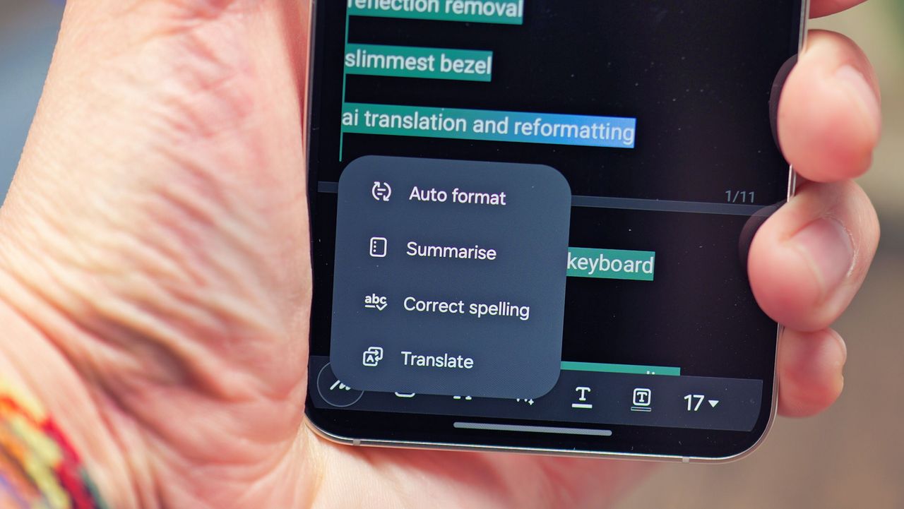 Samsung Galaxy S24 phone held in a hand with the screen showing a small menu