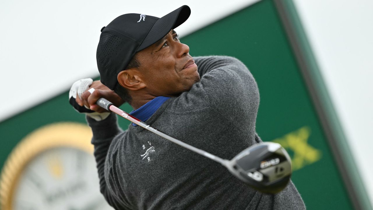 Tiger Woods watches his drive from the 13th tee on the opening day of the 152nd British Open Golf Championship at Royal Troon on the south west coast of Scotland on July 18, 2024. 