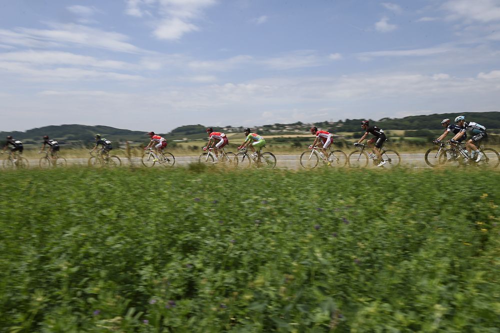 The peloton rolls through the French countryside during stage 4.