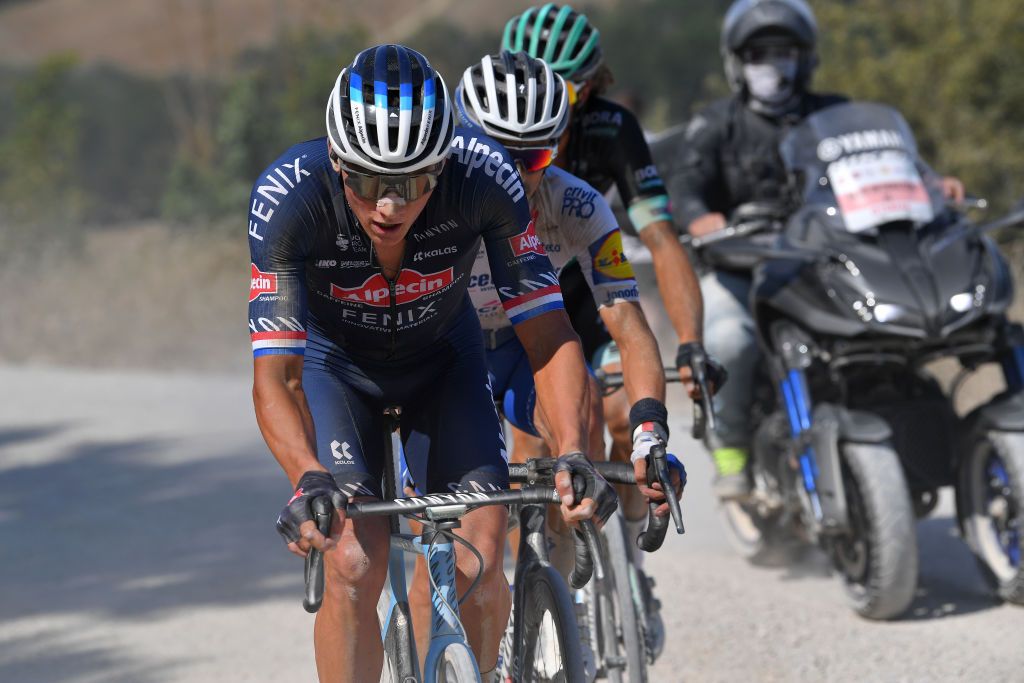 Mathieu van der Poel (Alpecin-Fenix) attempts to chase back to the front of the race after suffering a puncture at the 2020 Strade Bianche