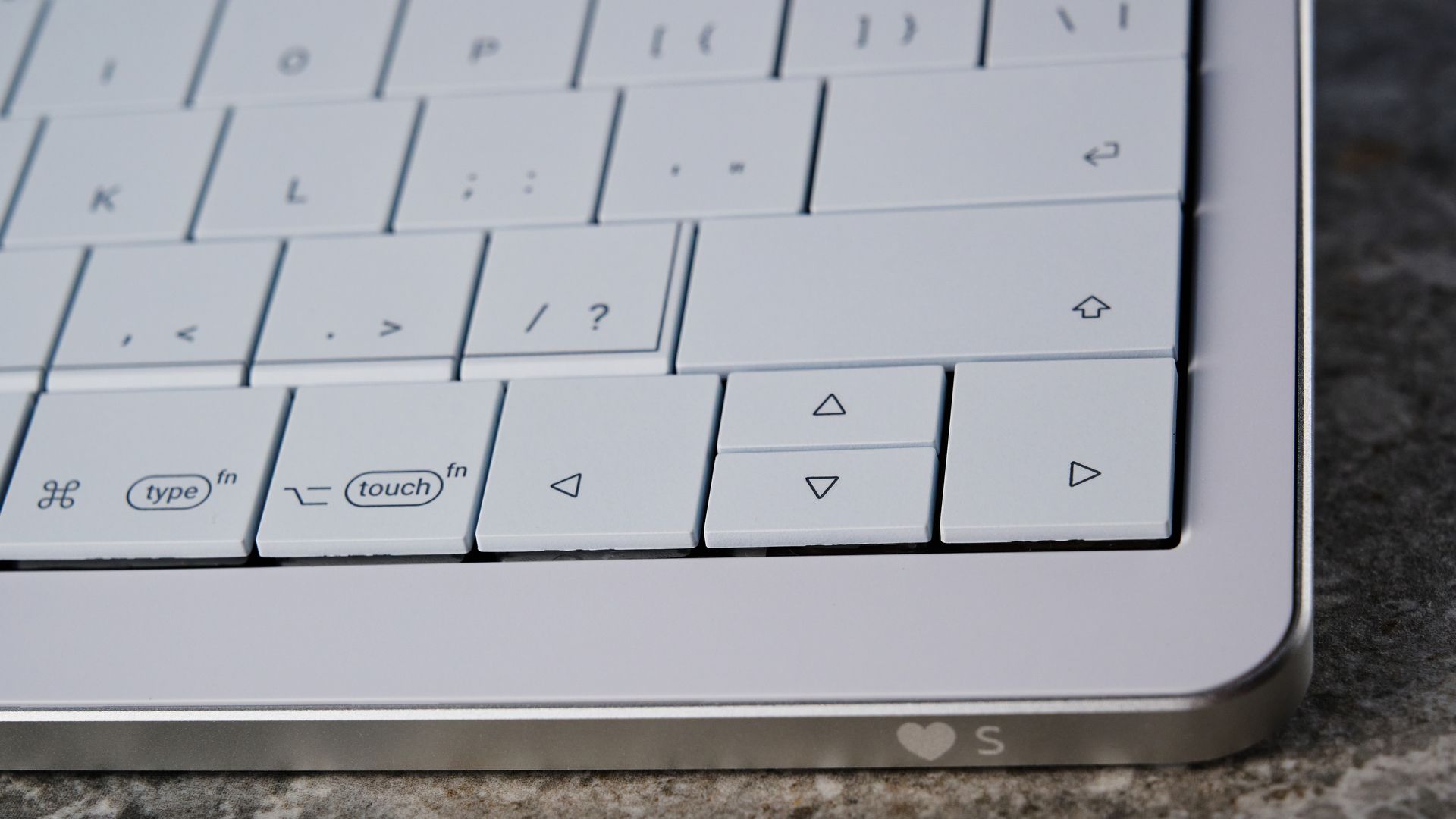 A white Clevetura CLVX S keyboard