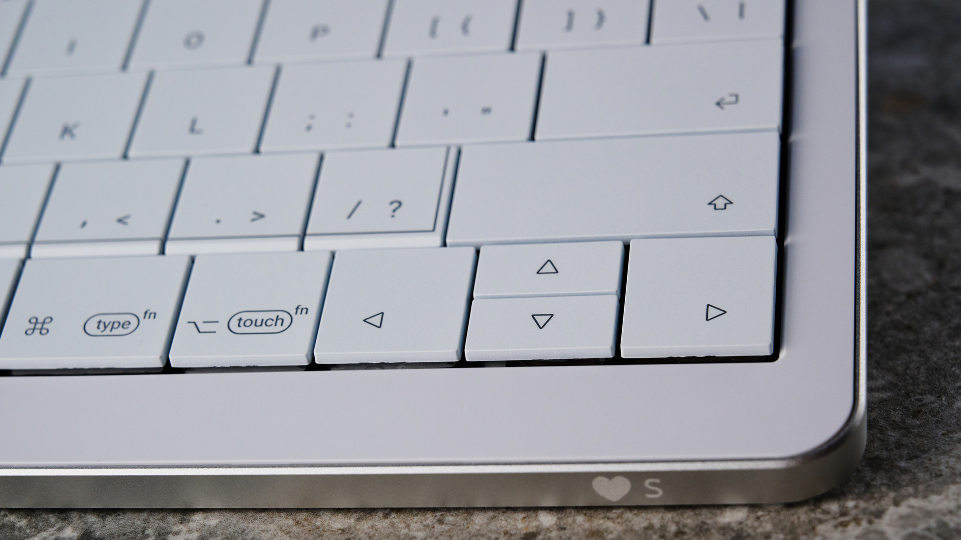 A white Clevetura CLVX S keyboard