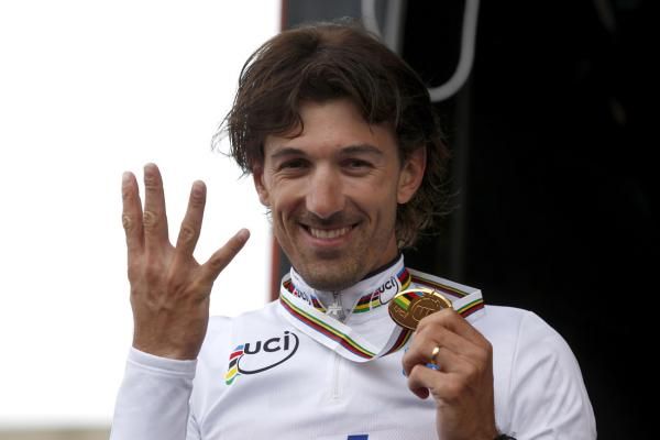 Four times the glory. Fabian Cancellara takes another rainbow jersey.