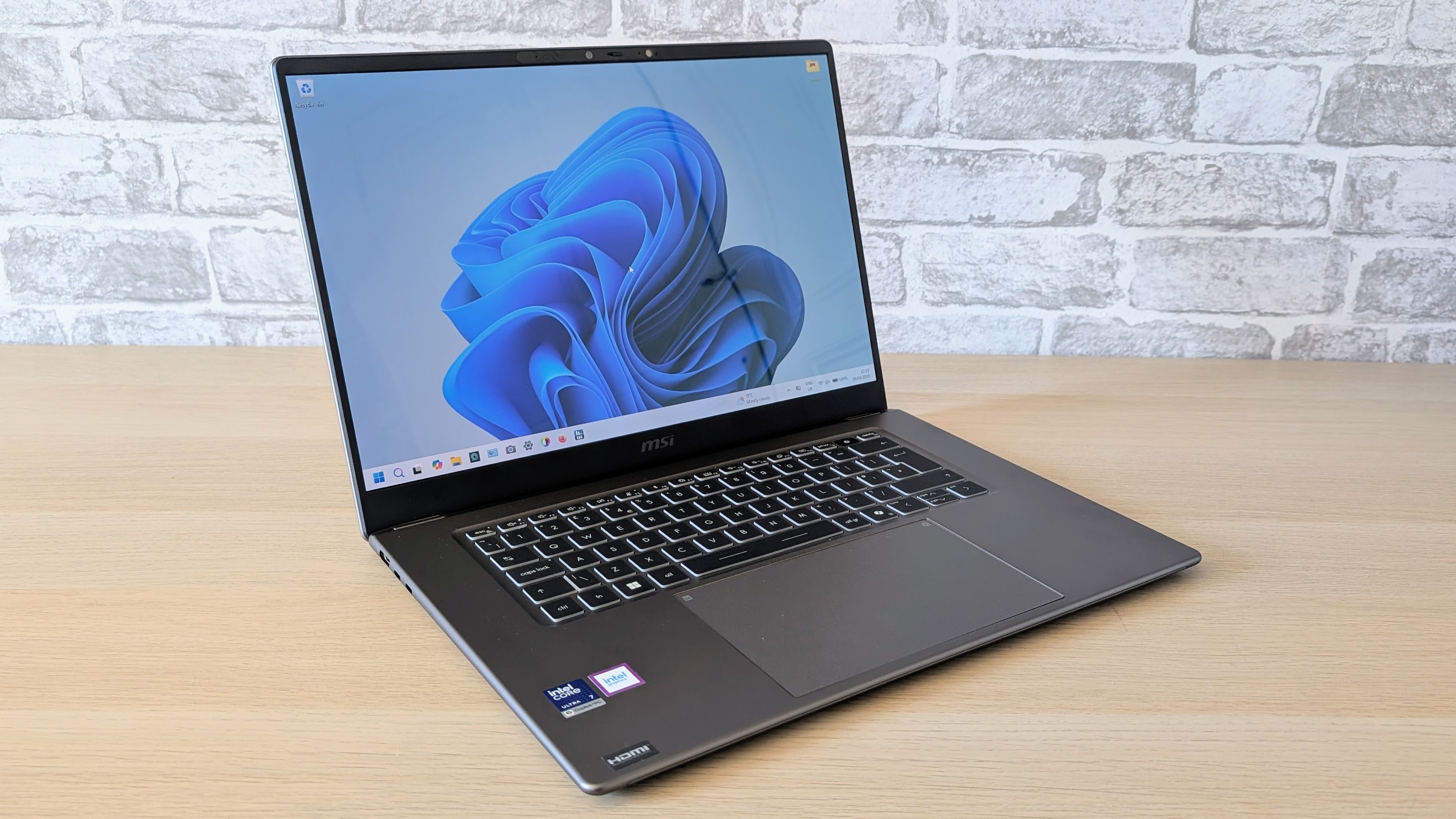 The MSI Prestige A16 AI+ on the ITPro background