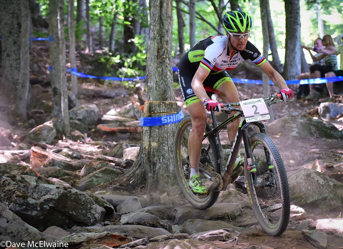 Gunn-Rita Dahle Flesjaa (Multivan Merida) riding in fifth place through the rocks