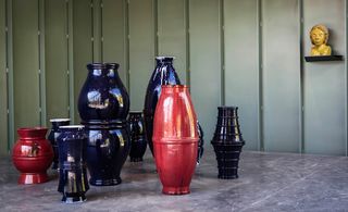 On display inside the pavilion are a series of glossy ceramic urns and heads by German artist Thomas Schütte, created especially for the structure's inauguration